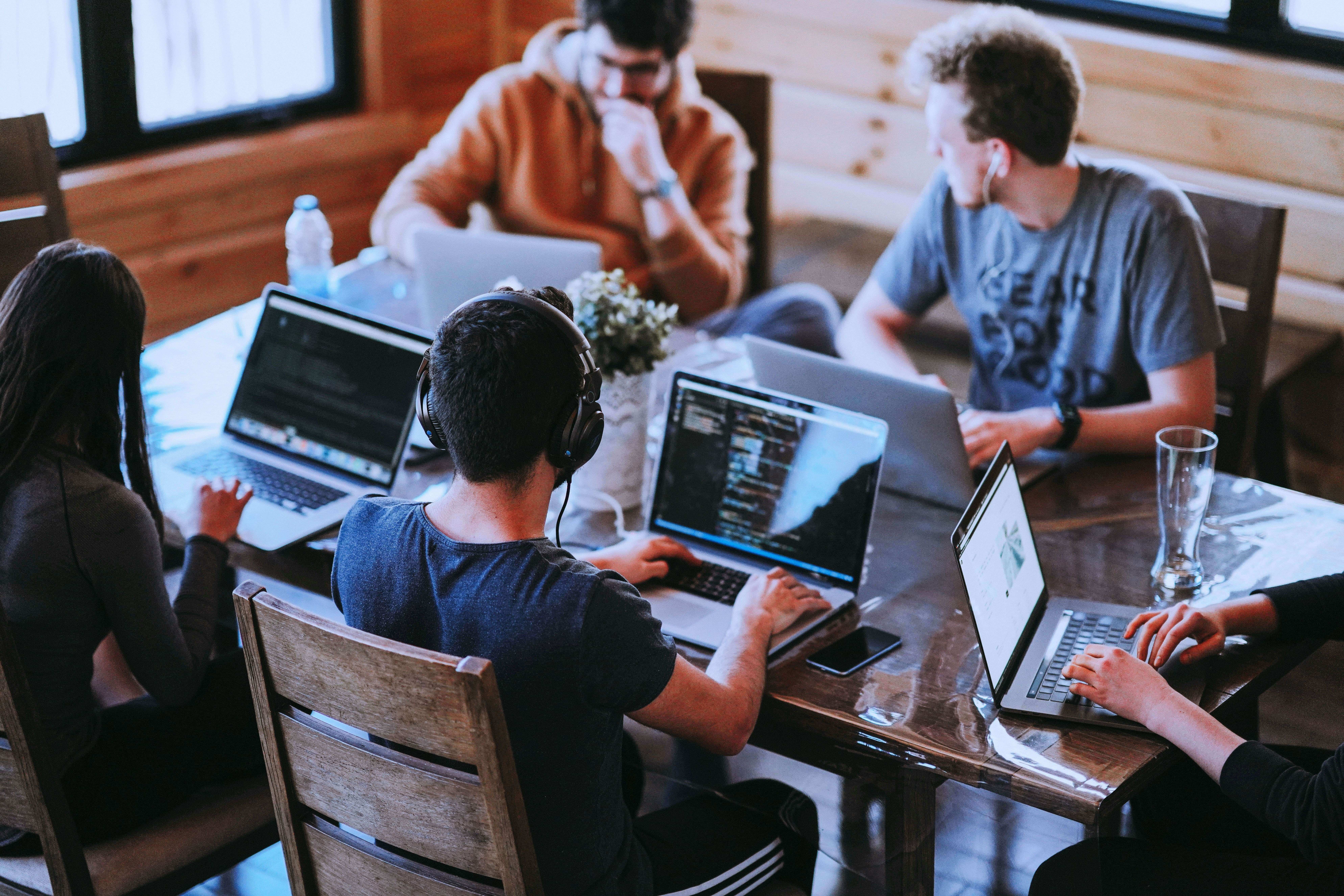 A high-perfoming Tech team working in an office